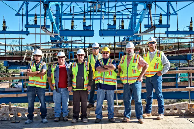 Construction crew in front of  cantilever