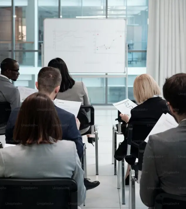 Team meeting with whiteboard