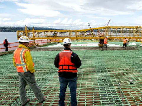 Marine construction crew across early building