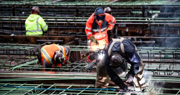 Construction crew welding